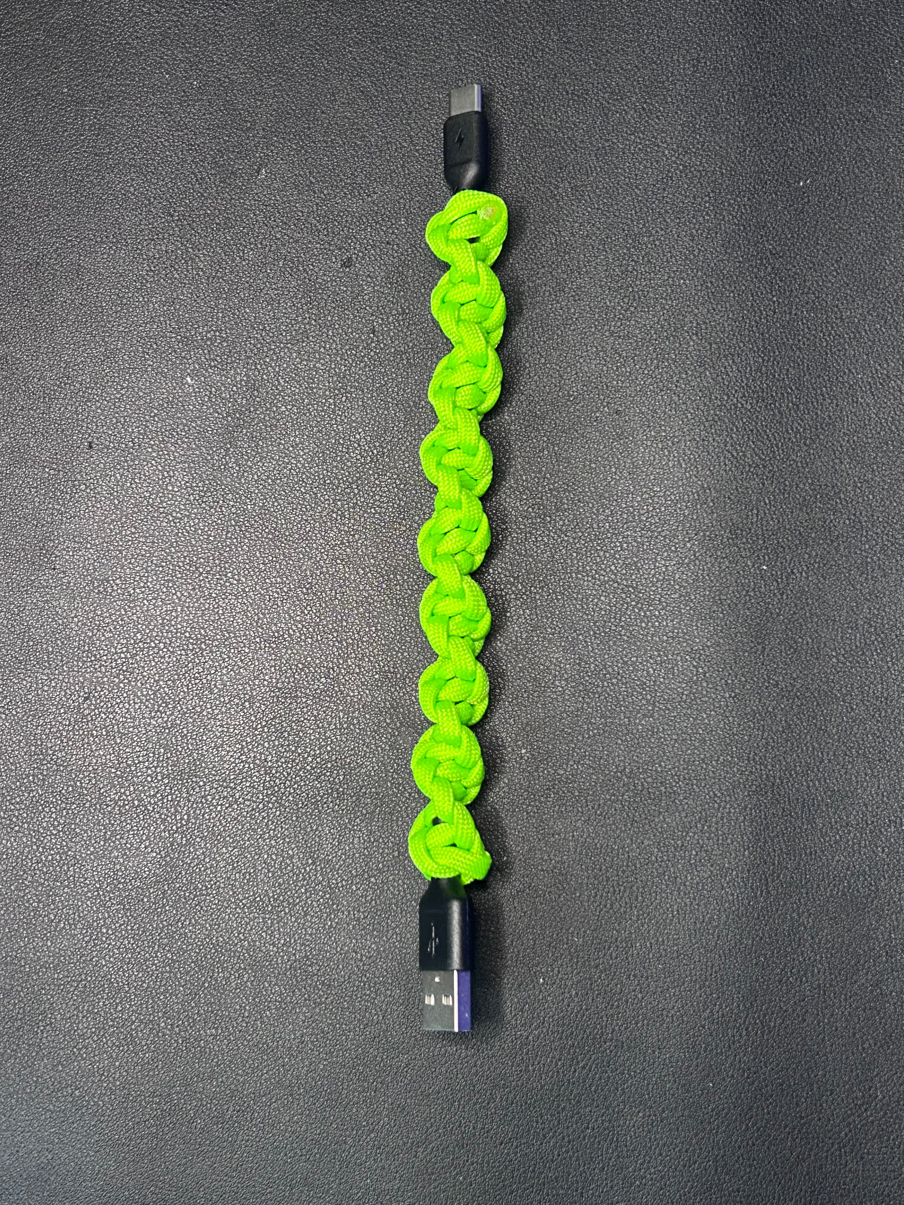 USB to C phone charger wrapped in paracord 550