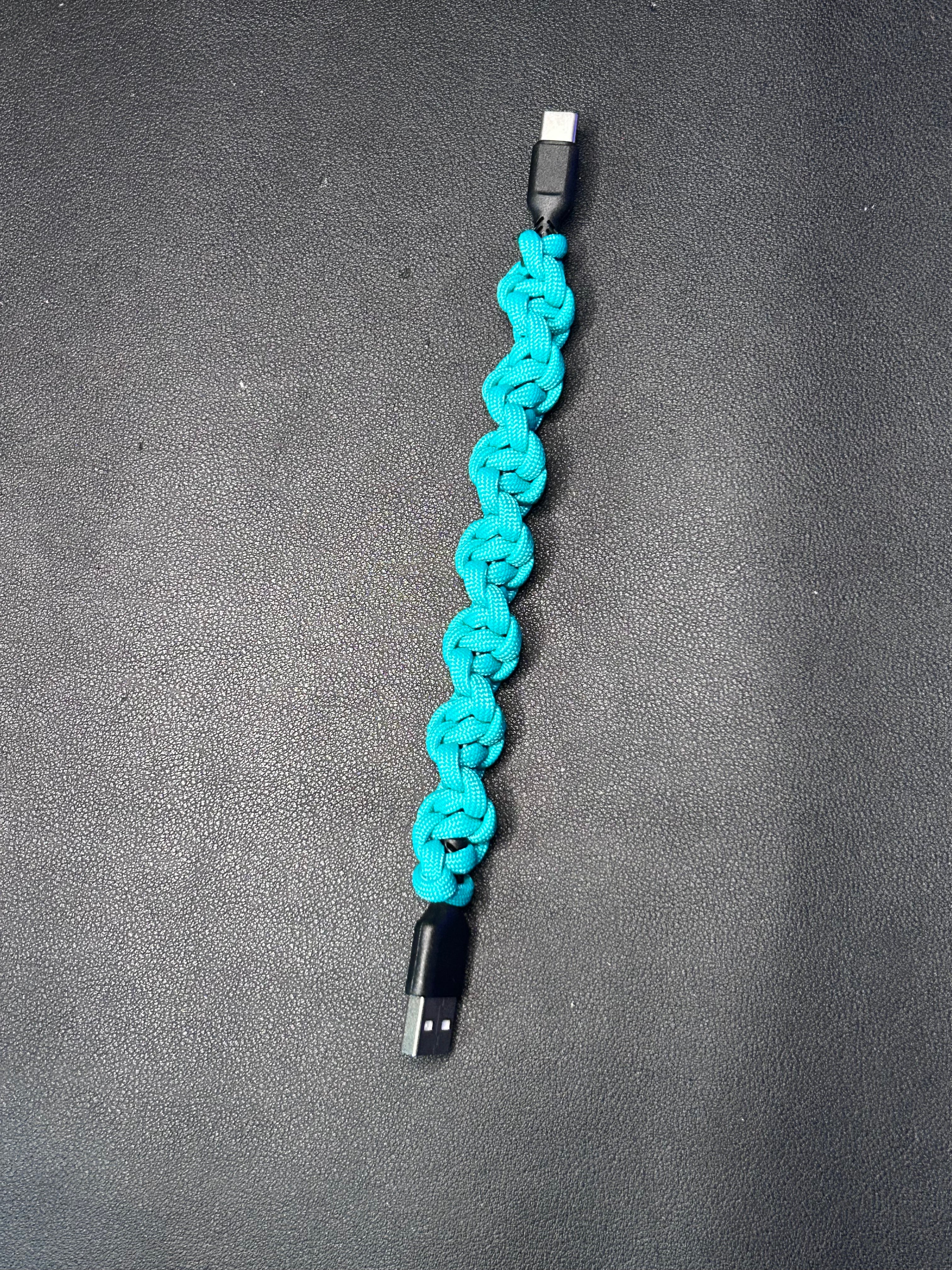 USB to C phone charger wrapped in paracord 550