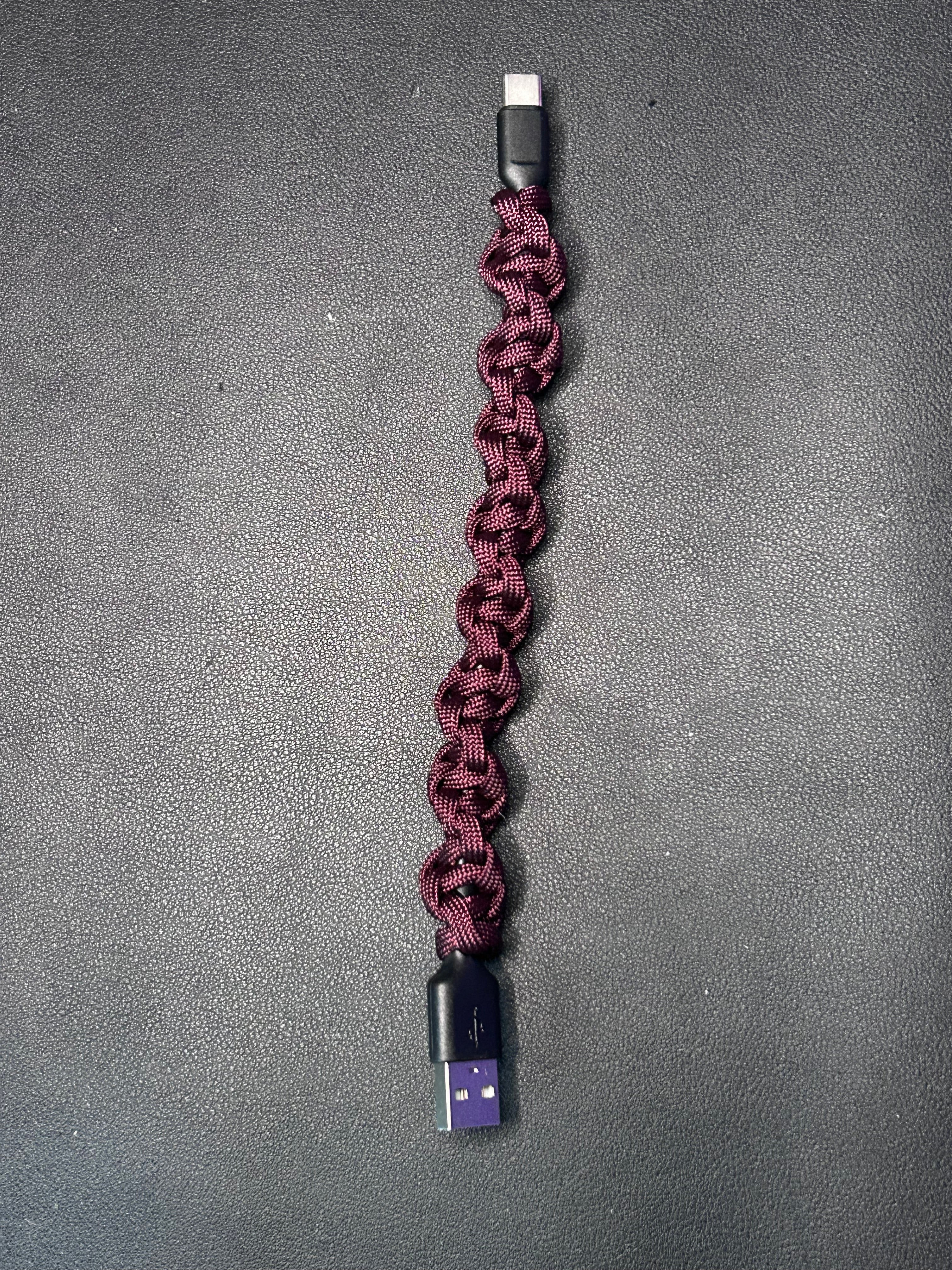 USB to C phone charger wrapped in paracord 550